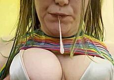 joan day shakes big ass solo in rainbow outfit