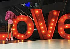 guarrita crossdresser exhibits in short skirt flashing panties