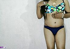 Indian shemale in blue bikini crossdresses with big cock tease