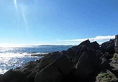 African prostitute shows off her juicy ass on nudist beach