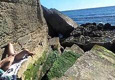 African prostitute shows off her juicy ass on nudist beach