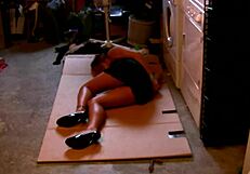 Bound blonde in heels begs for domination while tied up tight?