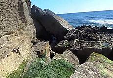 African prostitute shows off her juicy ass on nudist beach