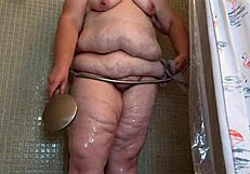 check out this big juicy bbw granny in shower flashing her thick curvy bubble butt and natural tits all dripping wet... chubby mature woman shows off that huge ass for camera