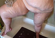 check out this big juicy bbw granny in shower flashing her thick curvy bubble butt and natural tits all dripping wet... chubby mature woman shows off that huge ass for camera