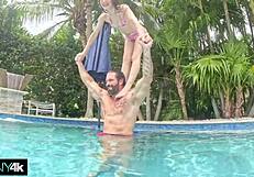 poolside babe soaks sun then takes monster cock deep