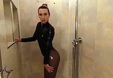 Latex Mistress Teases In Shower With Nylon Stockings And Leggings
