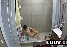 Luuv Beauty Grossy Lathers Up in the Shower, Flashing Her Perky Tits for Voyeur Eyes.