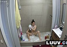 Luuv Beauty Grossy Lathers Up in the Shower, Flashing Her Perky Tits for Voyeur Eyes.