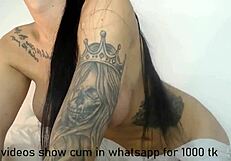 a tattooed shemale catches my eye her curves draw me in completely