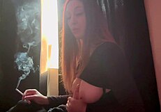 mmm loving my dildo handjob while puffing on a cigarette with these big italian tits