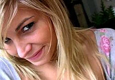 Smoking ignites her teasing passion in panties and heels