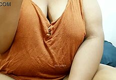 Tamil Aunty's Massive Boobs Tempt Wild Ride!