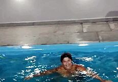 Hot Day Redhead Basks Nude in Pool