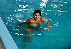 Hot Day Redhead Basks Nude in Pool