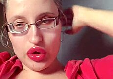 Red lipgloss bimbo goddess mesmerizes you into wallet-draining webcam lip worship session