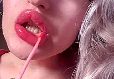 Red lipgloss bimbo goddess mesmerizes you into wallet-draining webcam lip worship session