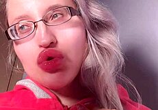 Red lipgloss bimbo goddess mesmerizes you into wallet-draining webcam lip worship session