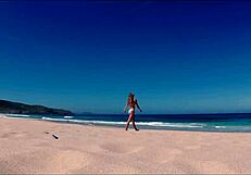 travel show host sasha ikeyeva flaunts ass in bikini on spanish doninos beach