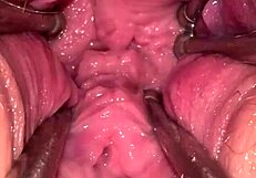 Fist queen's pussy stretches wide with metal ring.