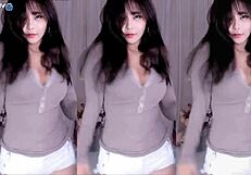 Korean cutie dances sexy with big tits bouncing for the guys