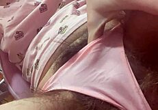 I throb rubbing vibrator on big clit through soaked panties