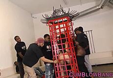 horny slut chokes on multiple black cocks in interracial blowbang