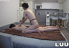 Alice massages with tattooed bare tits