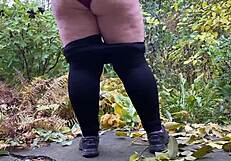 naughty thrill hits as hot mature pees standing doggystyle in leggings