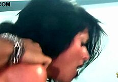 busty babe in glasses watches brunette's big tits bounce as her booty gets drilled doggystyle deepthroat style