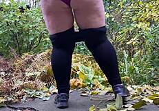 naughty thrill hits as hot mature pees standing doggystyle in leggings