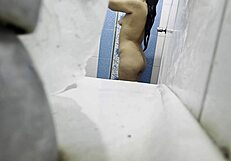 caught on hidden cam in bathroom as cute couple flashes ass legs and shaved pussy in lingerie