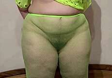 Chubby amateur BBW milf stuffs huge dildos in pantyhose-covered big ass on bed to cum!