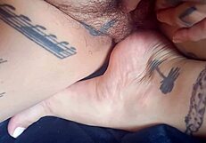her huge hairy pussy and feet draw him into irresistible podolatria fetish licking