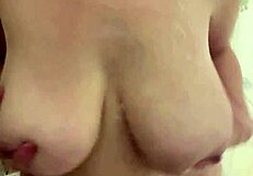 Xxxsilkylicorice masturbates her big natural tits in steamy solo shower bath
