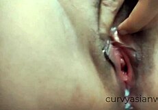 close-up view of thai milf pussy pissing stream.