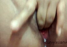 close-up view of thai milf pussy pissing stream.