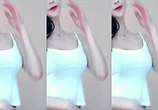 Chinese babe dances sexy on wild coaster