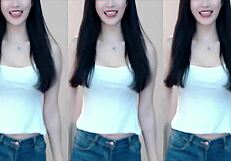 Chinese babe dances sexy on wild coaster