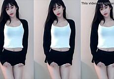 Chinese babe dances sexy on wild coaster