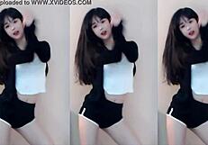 Chinese babe dances sexy on wild coaster