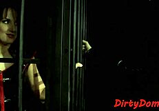 check out this caged sub getting dildo stuffed mouth pussy