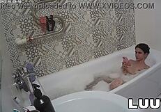 Luuv Vilika bares small tits in private late-night bathroom flash voyeur