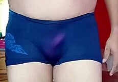 femboy sways seductively in sheer intimate lingerie