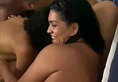 exhibitionist spreads legs flashing trimmed pussy for crowd licks