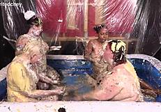 four hot women get messy licking pussies eating food in lesbian orgy