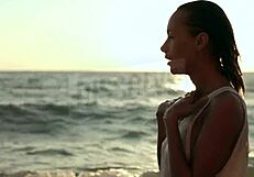 BLONDE RUSSIAN in see-through bra on beach nipples hard wet skin glistening with salt SEXY tease