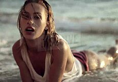 BLONDE RUSSIAN in see-through bra on beach nipples hard wet skin glistening with salt SEXY tease