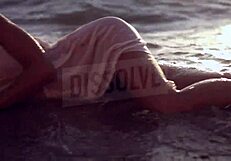 BLONDE RUSSIAN in see-through bra on beach nipples hard wet skin glistening with salt SEXY tease