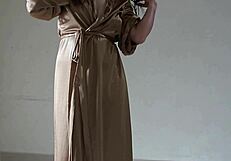 whoa, check out this big ass asian in satin robe shaking it